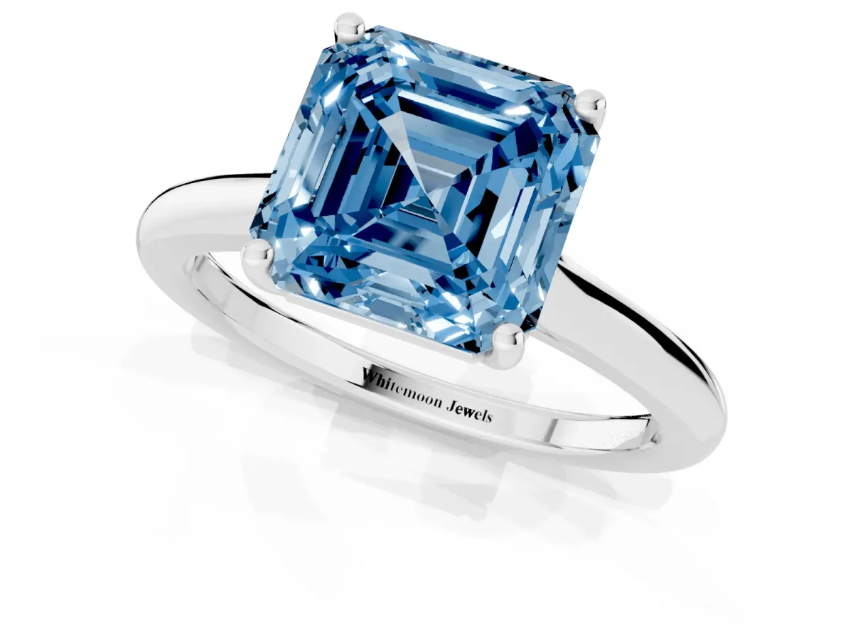 Fancy Blue Asscher Cut Cut Solitaire Ring with Cathedral Band and Four-Prong Setting Silver
