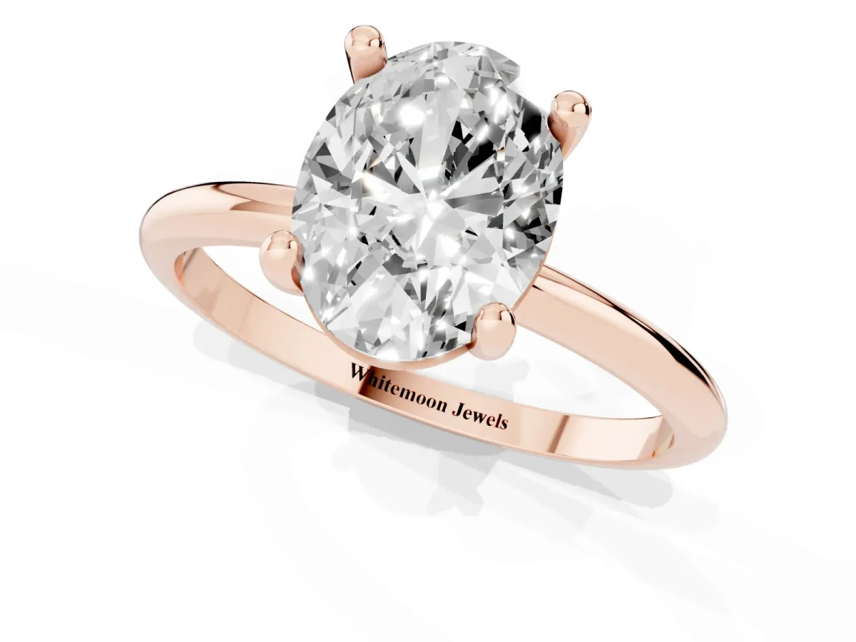 Oval Cut Solitaire Diamond Ring with 4-Prong Setting on a Classic Band Rose gold
