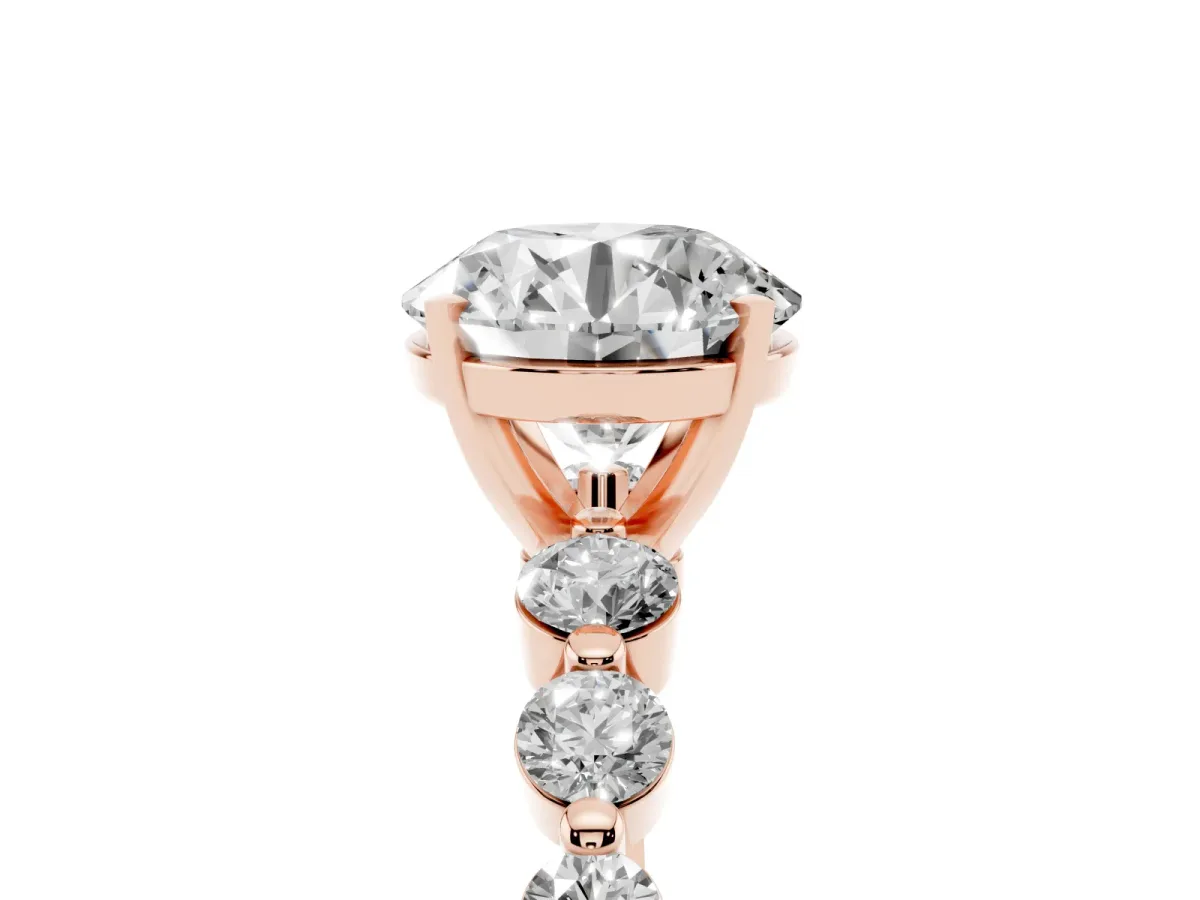 Round Cut Solitaire Diamond Ring with Pave Band and Four-Prong Setting Rose gold