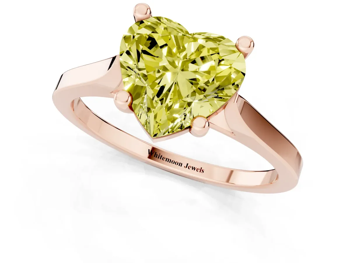 Fancy Yellow Heart Cut Solitaire Diamond Ring with Four-Prong Setting and Tapered Band Rose gold