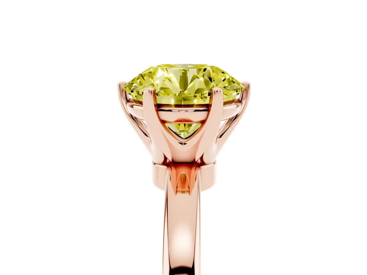 Fancy Yellow Round Cut Solitaire Diamond Ring with Six-Prong Setting on a Classic Band Rose gold