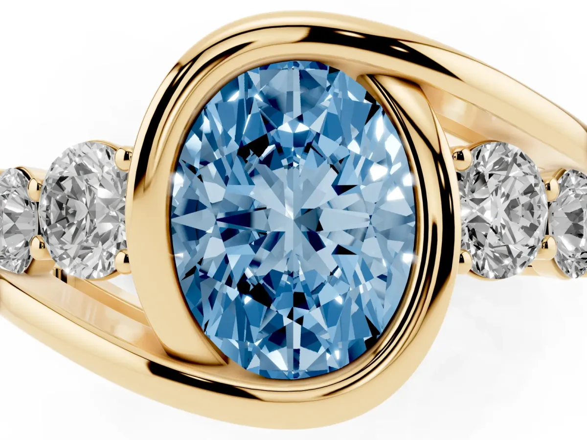 Fancy Blue Bezel Set Oval Cut Diamond Bypass Ring with Round Accents Yellow gold