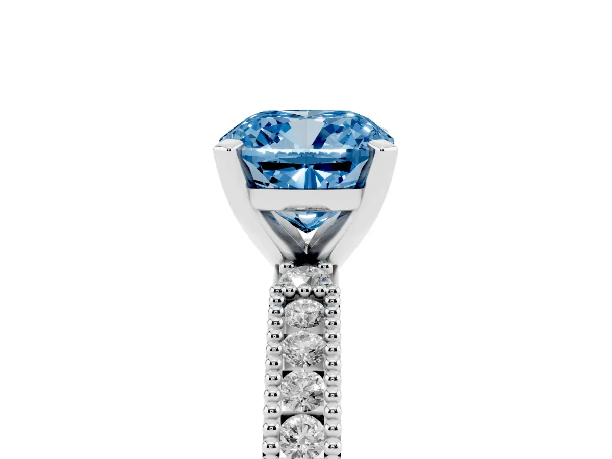 Fancy Blue Cushion Cut Solitaire with Pavé Band and Four-Prong Setting Silver