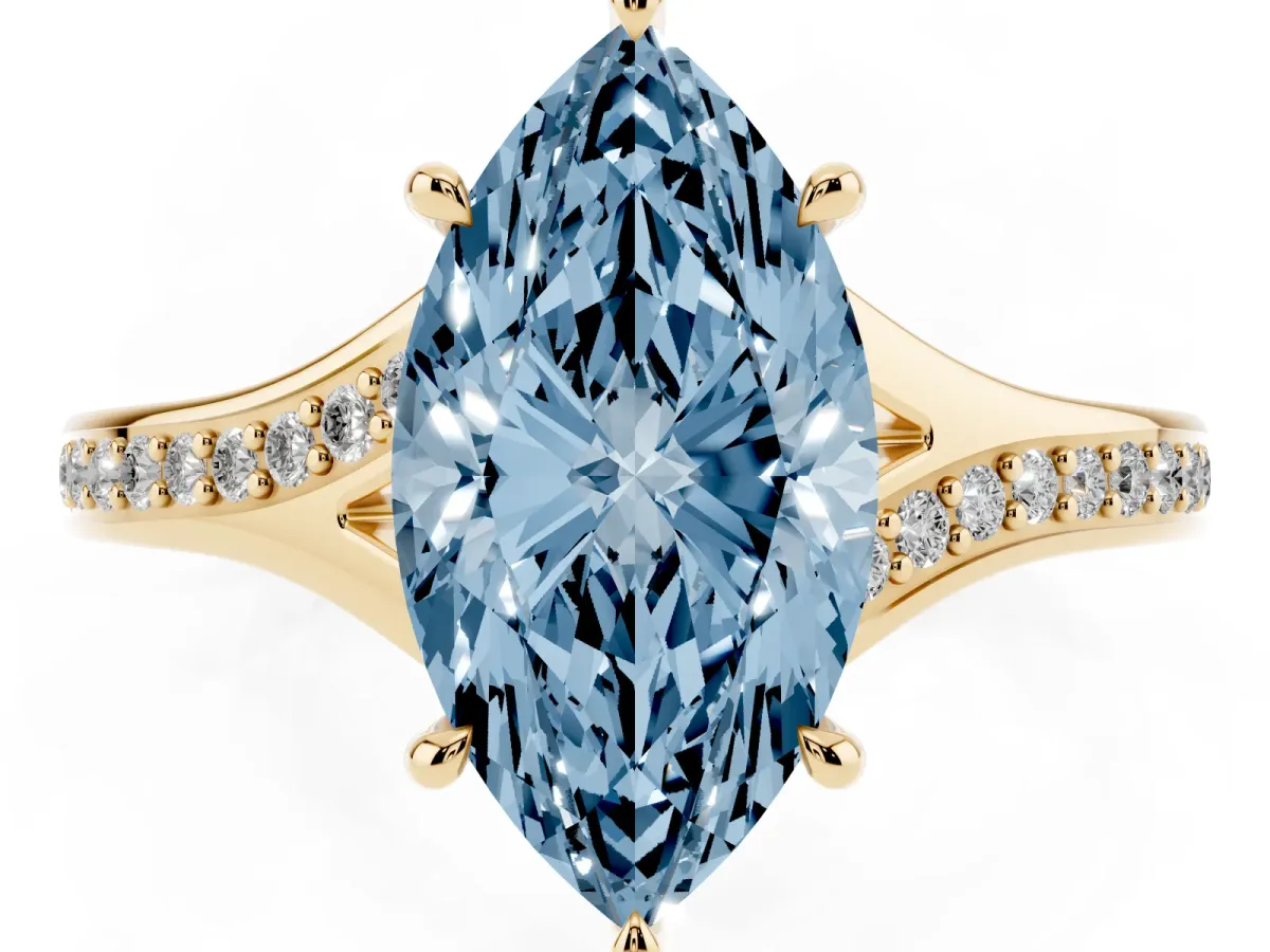 Fancy Blue Marquise Cut Diamond Solitaire Ring with Pavé Band and Prong Setting Yellow gold