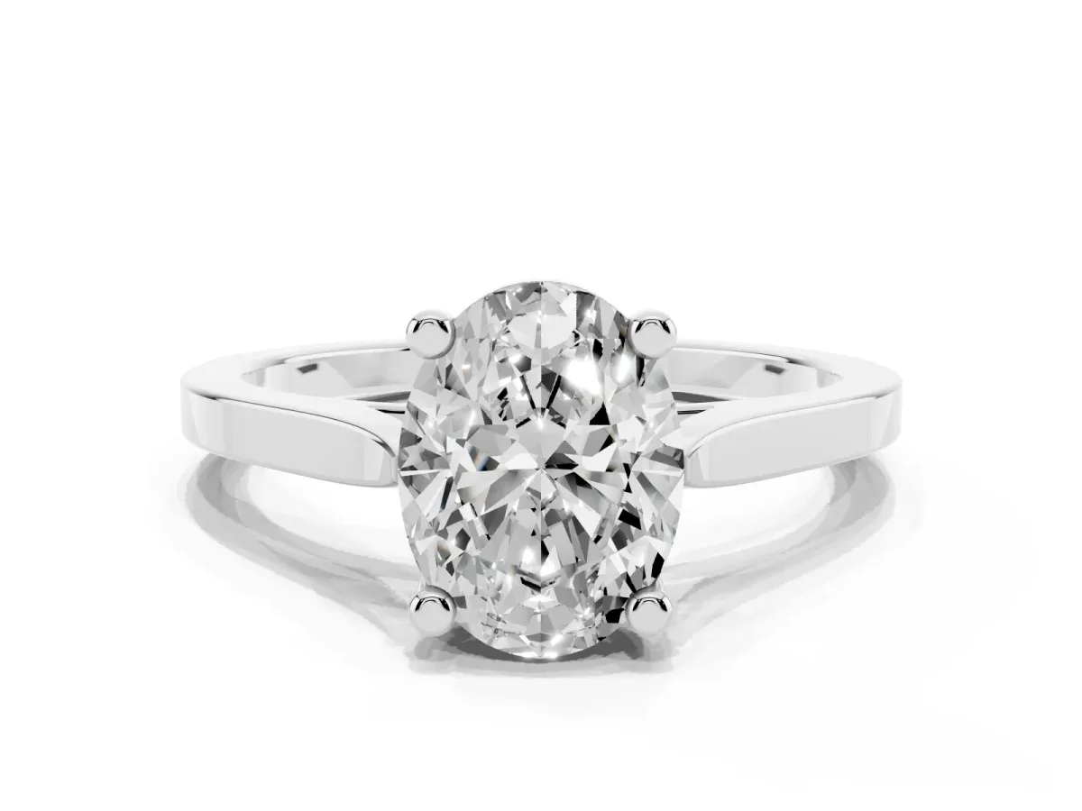 Oval Cut Solitaire Diamond Ring with Four-Prong Setting and Tapered Band Silver