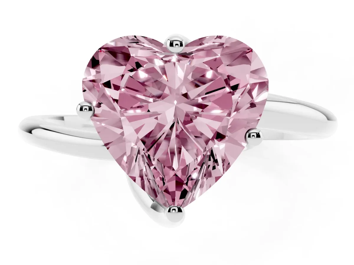 Fancy Pink Heart Cut Diamond Solitaire Engagement Ring with Four-Prong Setting and Classic Band Silver