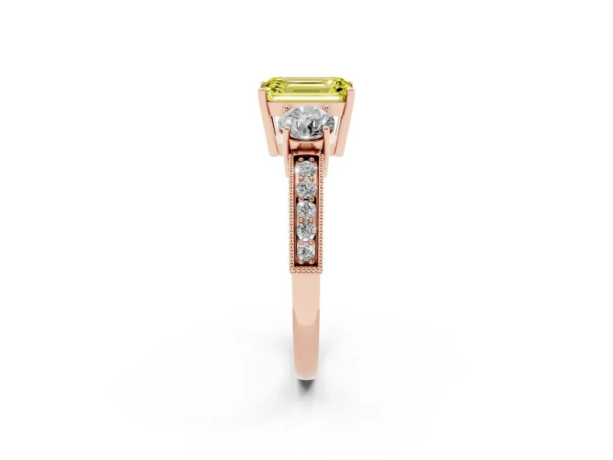 Fancy Yellow Emerald Cut Three-Stone Diamond Ring with Pavé Band and Four-Prong Setting Rose gold