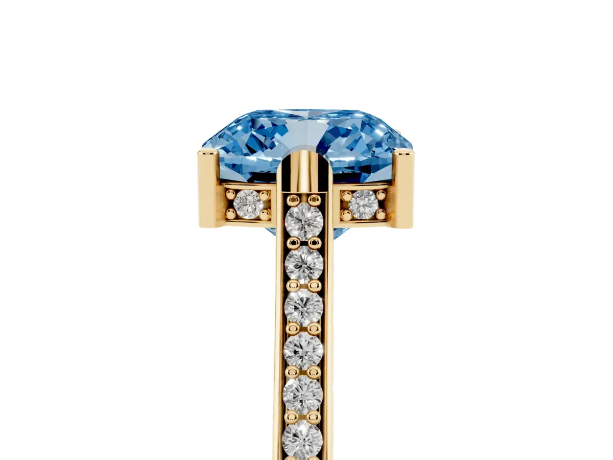Fancy Blue Cushion Cut Solitaire Diamond Ring with Channel Set Band and Bezel Prong Setting Yellow gold