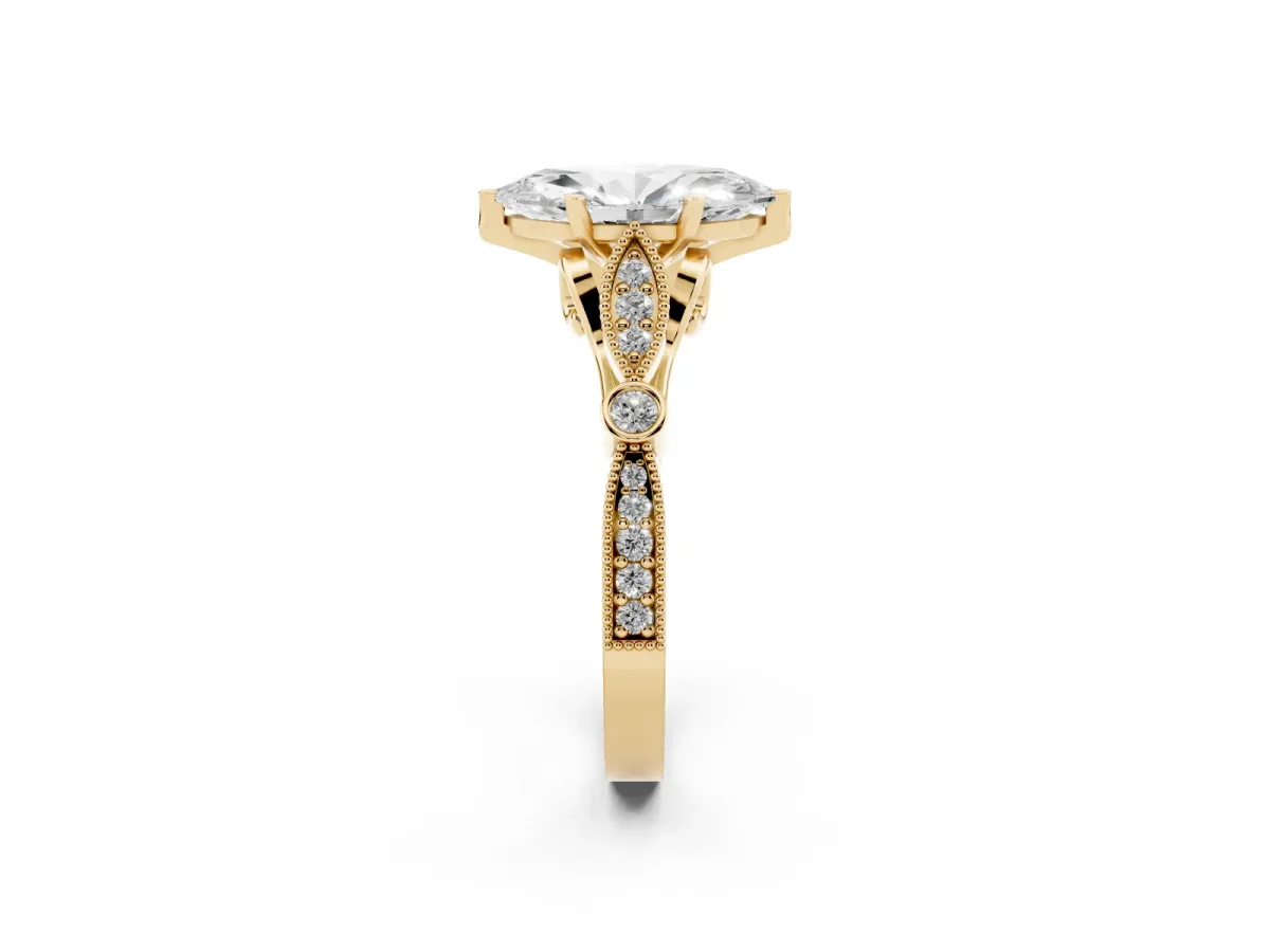 Marquise Cut Cut Diamond with Milgrain Marquise and Bezel Accents on a Solitaire Band with Prong Setting Yellow gold