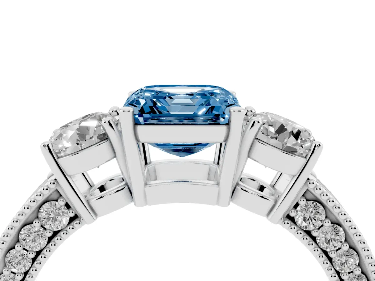 Fancy Blue Asscher Cut Three-Stone Diamond Ring with Pavé Band and Four-Prong Setting Silver