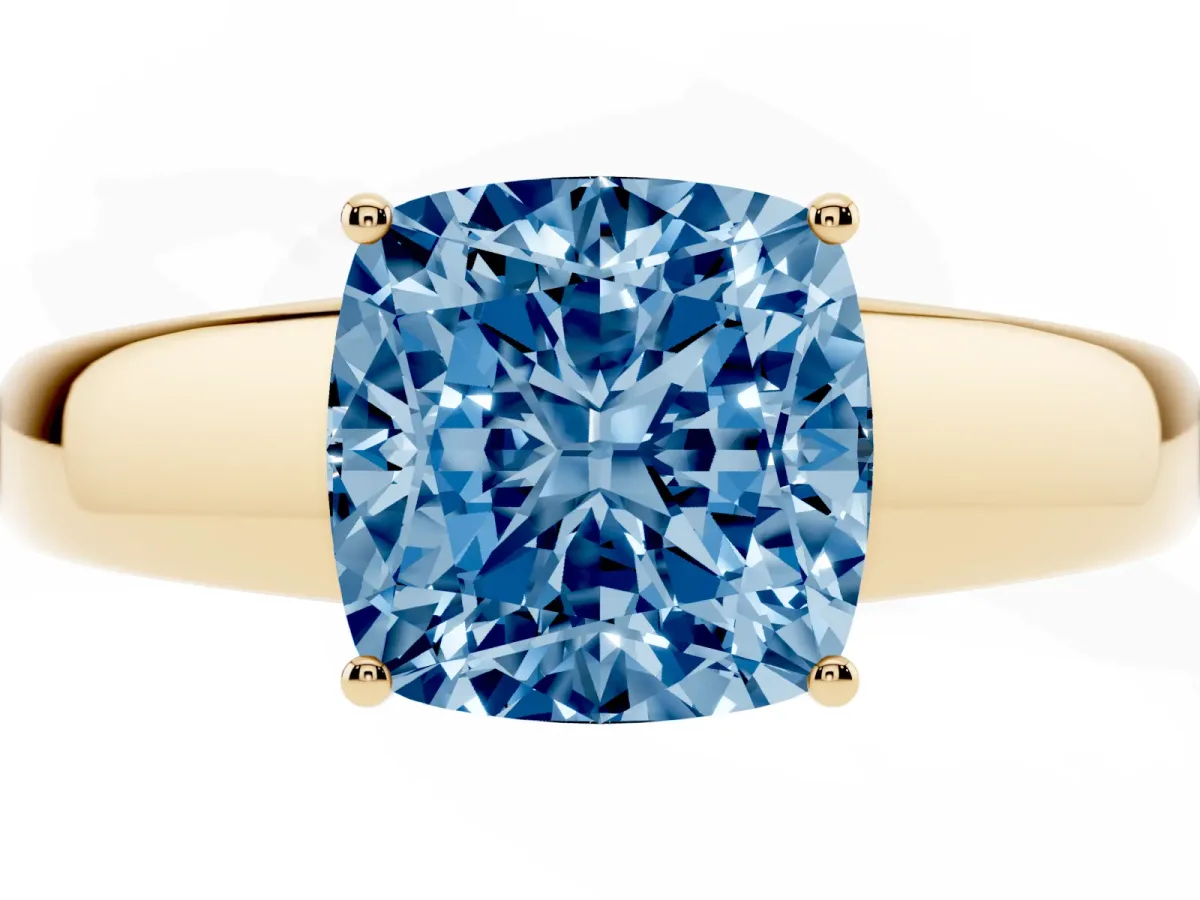 Fancy Blue Cushion Cut Solitaire Diamond Ring with Tapered Band and Four-Prong Setting Yellow gold