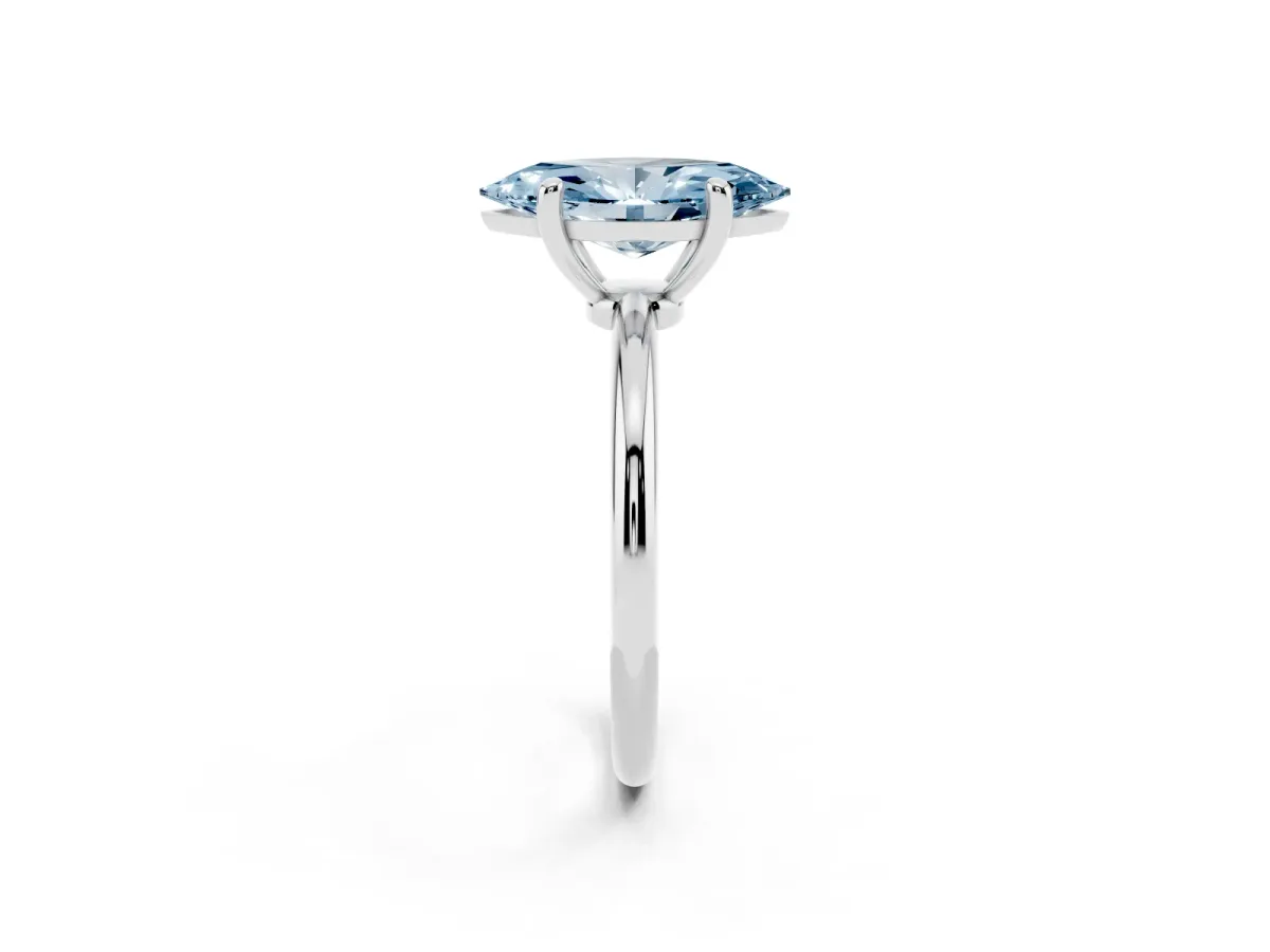 Fancy Blue Marquise Cut Solitaire Diamond Ring with 4-Prong Setting on a Classic Band Silver
