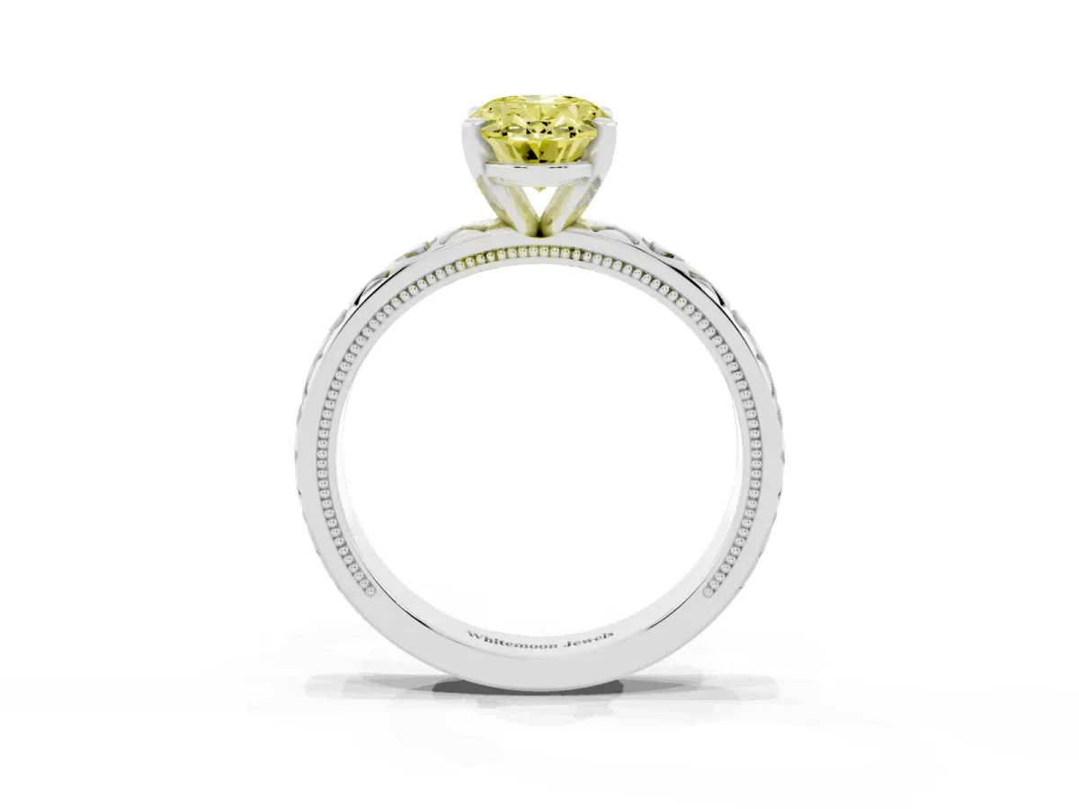 Fancy Yellow Oval Cut Solitaire Diamond Engagement Ring with XO Engraved Band and Four-Prong Setting Platinum