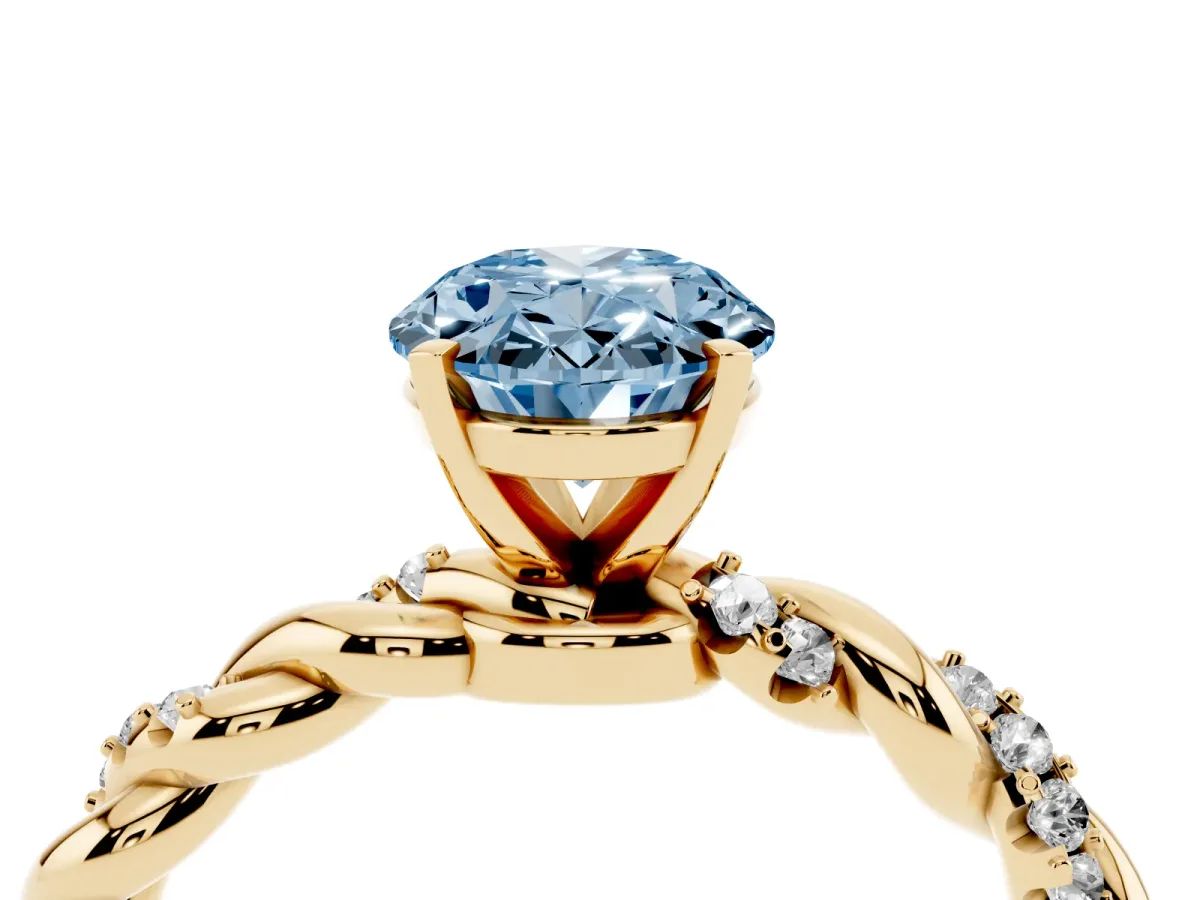 Fancy Blue Oval Cut Diamond Solitaire Ring with Twisted Band and Pavé Accents Yellow gold
