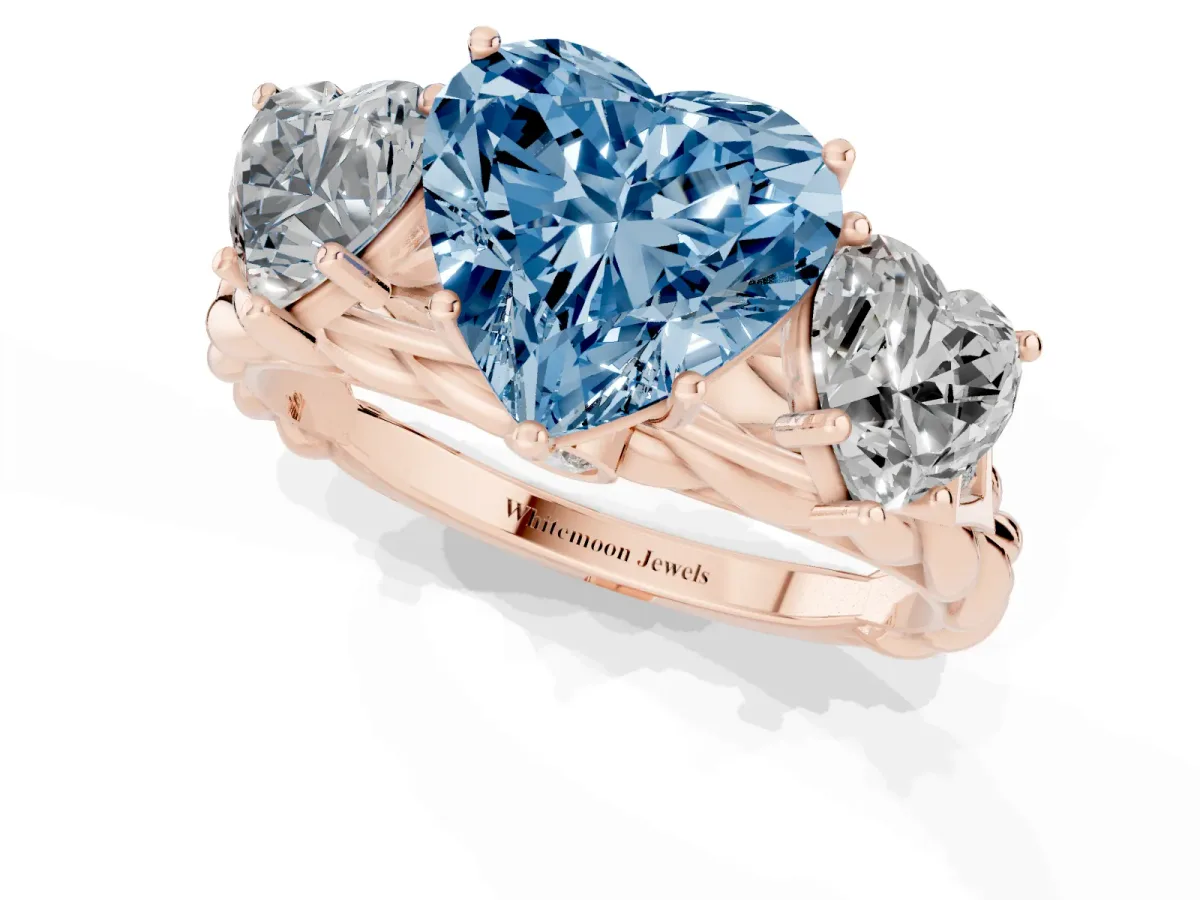 Fancy Blue Three-Stone Heart Cut Diamond Braided Band Ring with Four-Prong Setting Rose gold