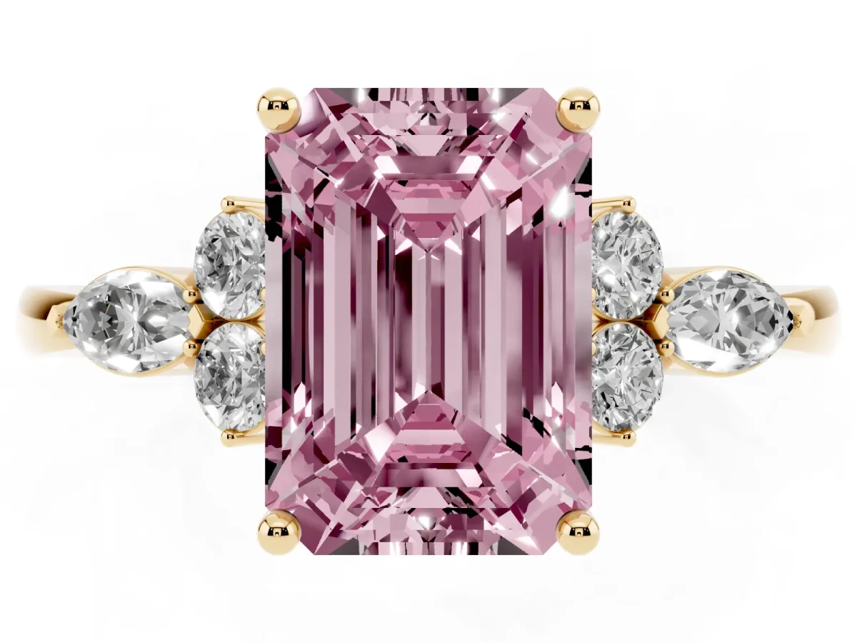 Fancy Pink Emerald Cut Brilliant Diamond Solitaire Ring with Pear Side Stones and Four-Prong Setting Yellow gold
