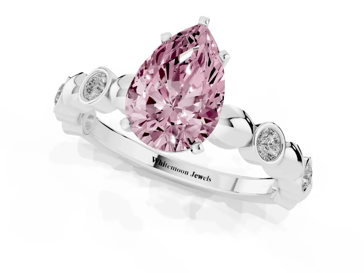 Fancy Pink Pear Cut Solitaire Bezel-Set Diamond Ring with Beaded Band and Four-Prong Setting Silver