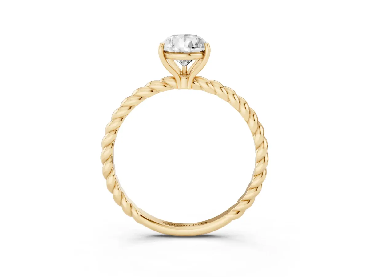 Pear Cut Solitaire Twist Band Ring with Four-Prong Setting Yellow gold