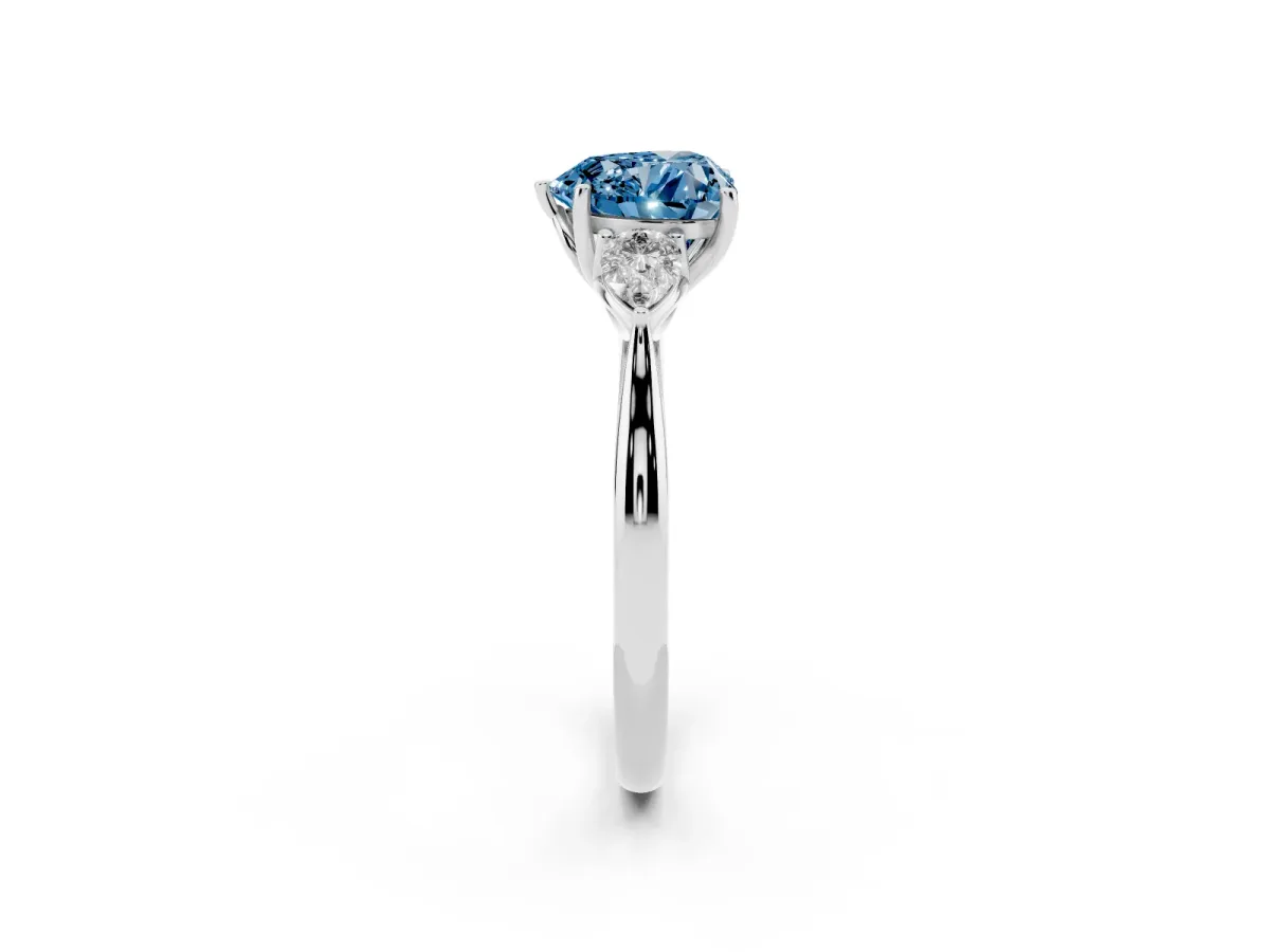 Fancy Blue Heart Cut Diamond Three-Stone Ring with Pear Side Stones and Prong Setting Silver