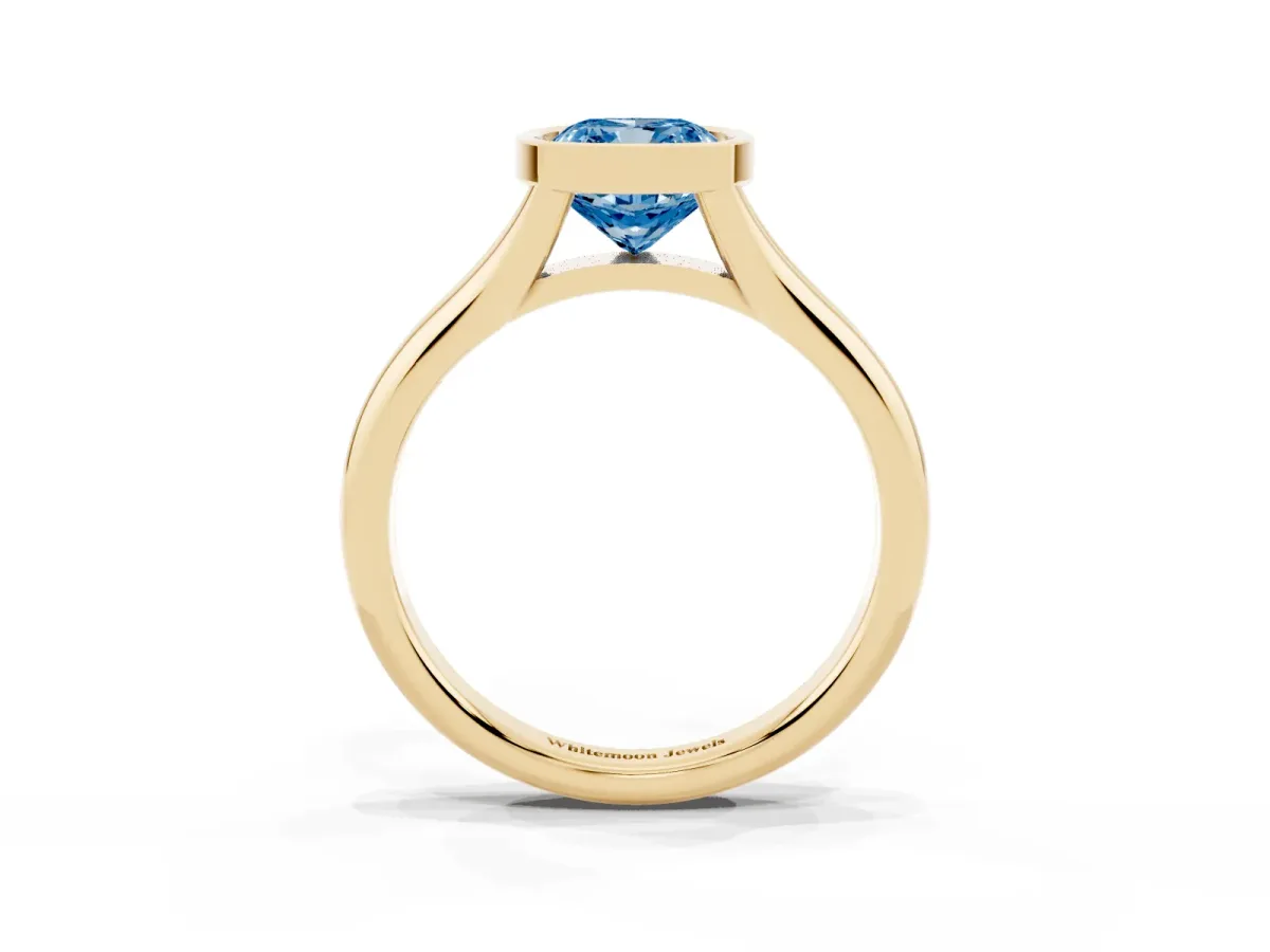 Fancy Blue Bezel Set Cushion Cut Solitaire Diamond Ring with Smooth Band Yellow gold