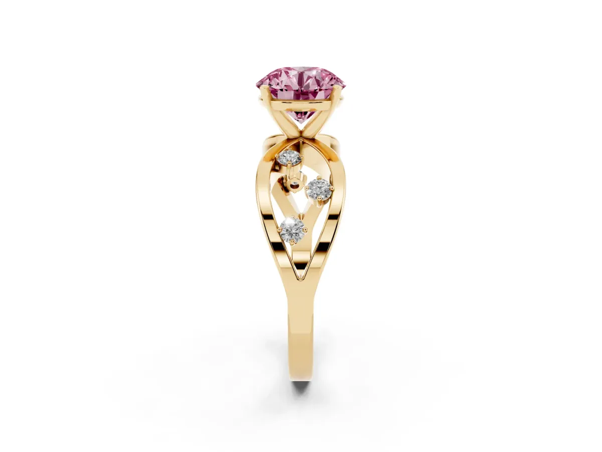 Fancy Pink Round Cut Cut Solitaire Diamond with Side Stones on Criss-Cross Band and Four-Prong Setting Yellow gold