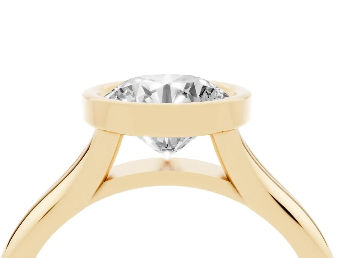 Bezel Set Round Cut Solitaire Diamond Ring with Smooth Band Yellow gold
