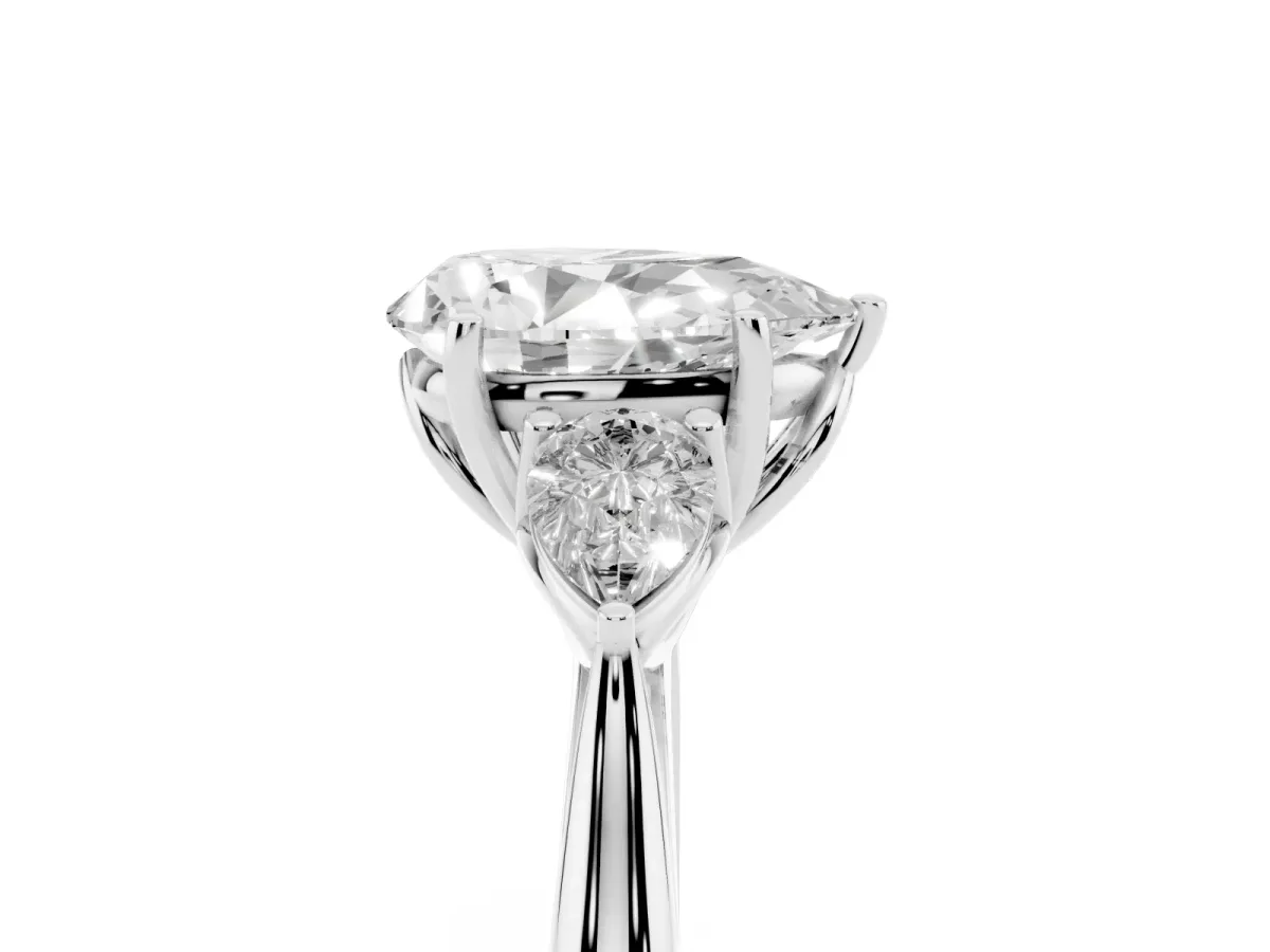 Three-Stone Pear Cut Brilliant Diamond Solitaire Ring with Tapered Band and Four-Prong Setting Platinum