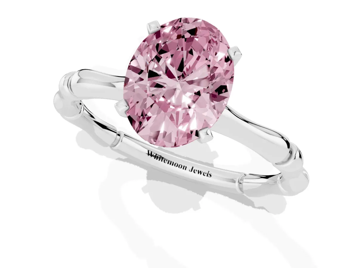 Fancy Pink Oval Cut Solitaire Diamond Ring with Bamboo Band and Four-Prong Setting Silver