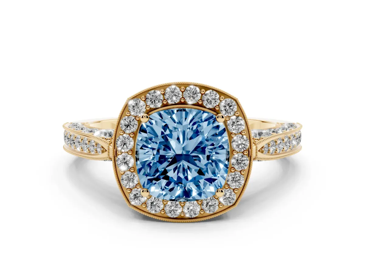 Fancy Blue Cushion Cut Halo Diamond Engagement Ring with Split Shank Band and Four-Prong Setting Yellow gold