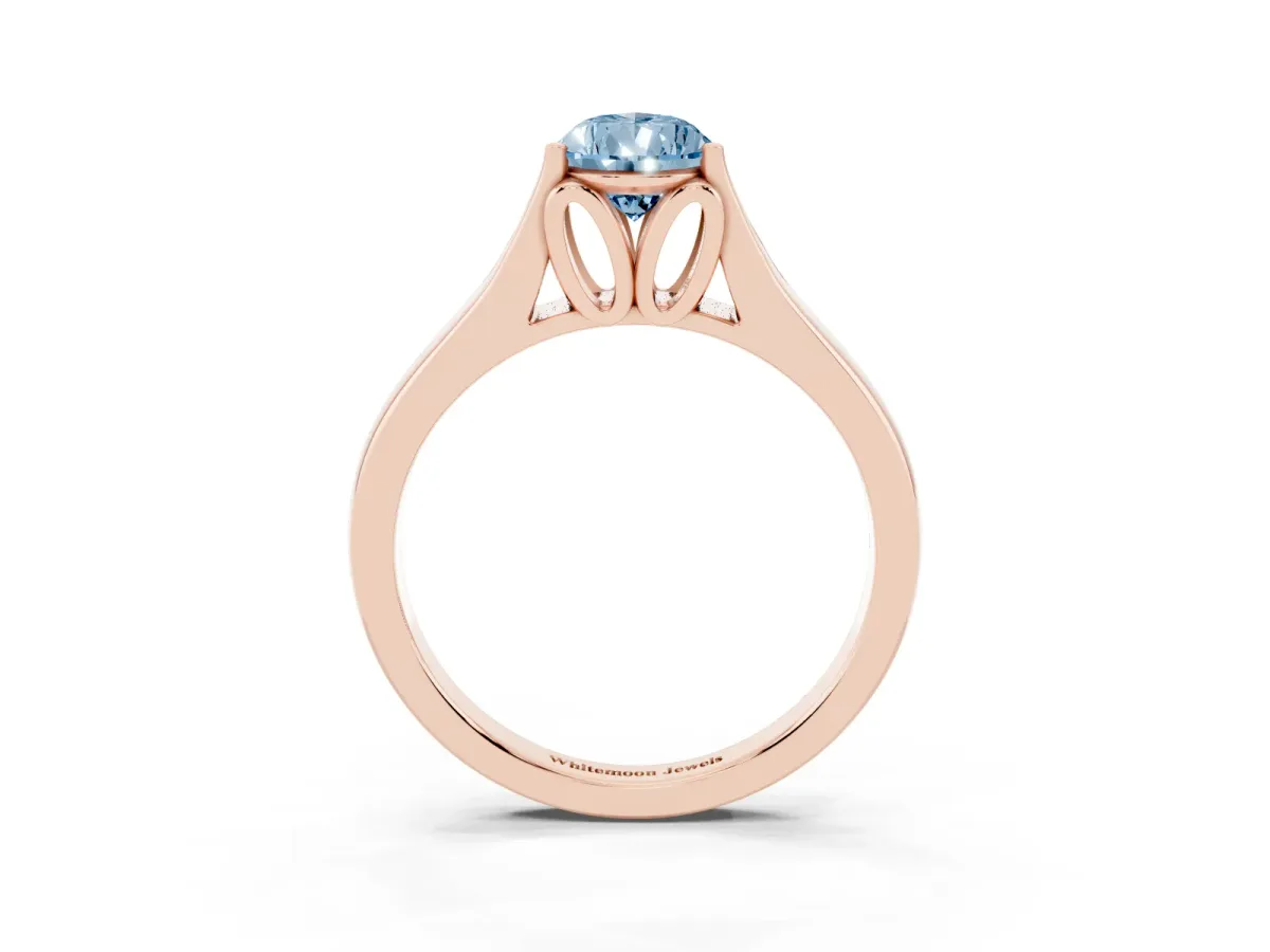 Fancy Blue Pear Cut Solitaire Diamond Ring with Cathedral Band and Four-Prong Setting Rose gold