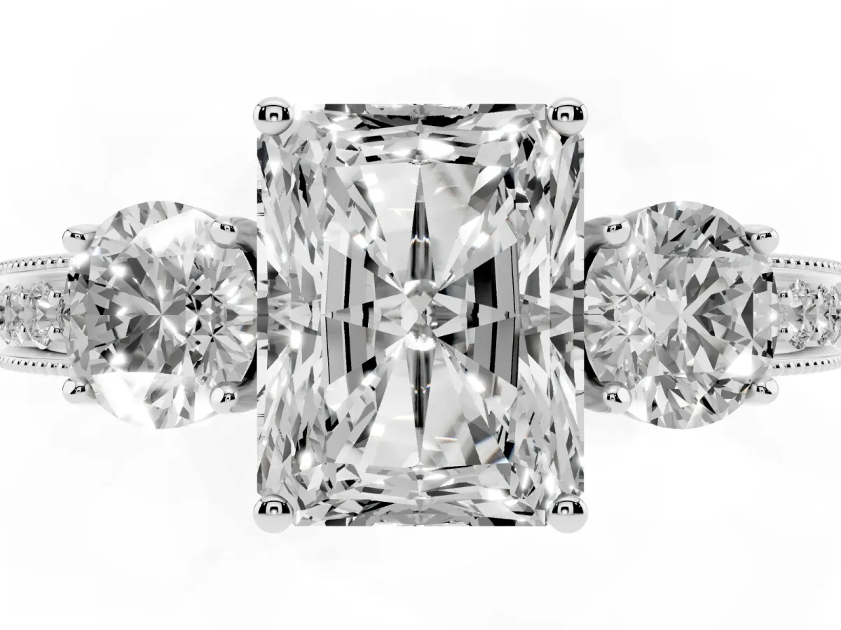 Radiant Cut Three-Stone Diamond Ring with Pavé Band and Four-Prong Setting Platinum