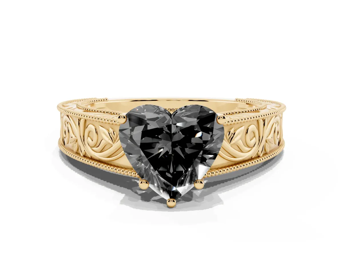 Fancy Black Heart Cut Diamond Solitaire Ring with Engraved Band and Four-Prong Setting Yellow gold