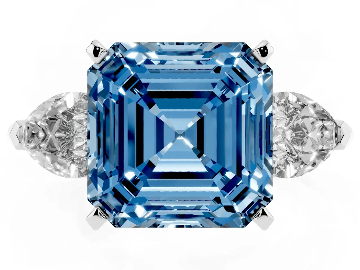 Fancy Blue Three-Stone Asscher Cut Diamond Ring with Pear Side Stones and Four-Prong Setting Platinum