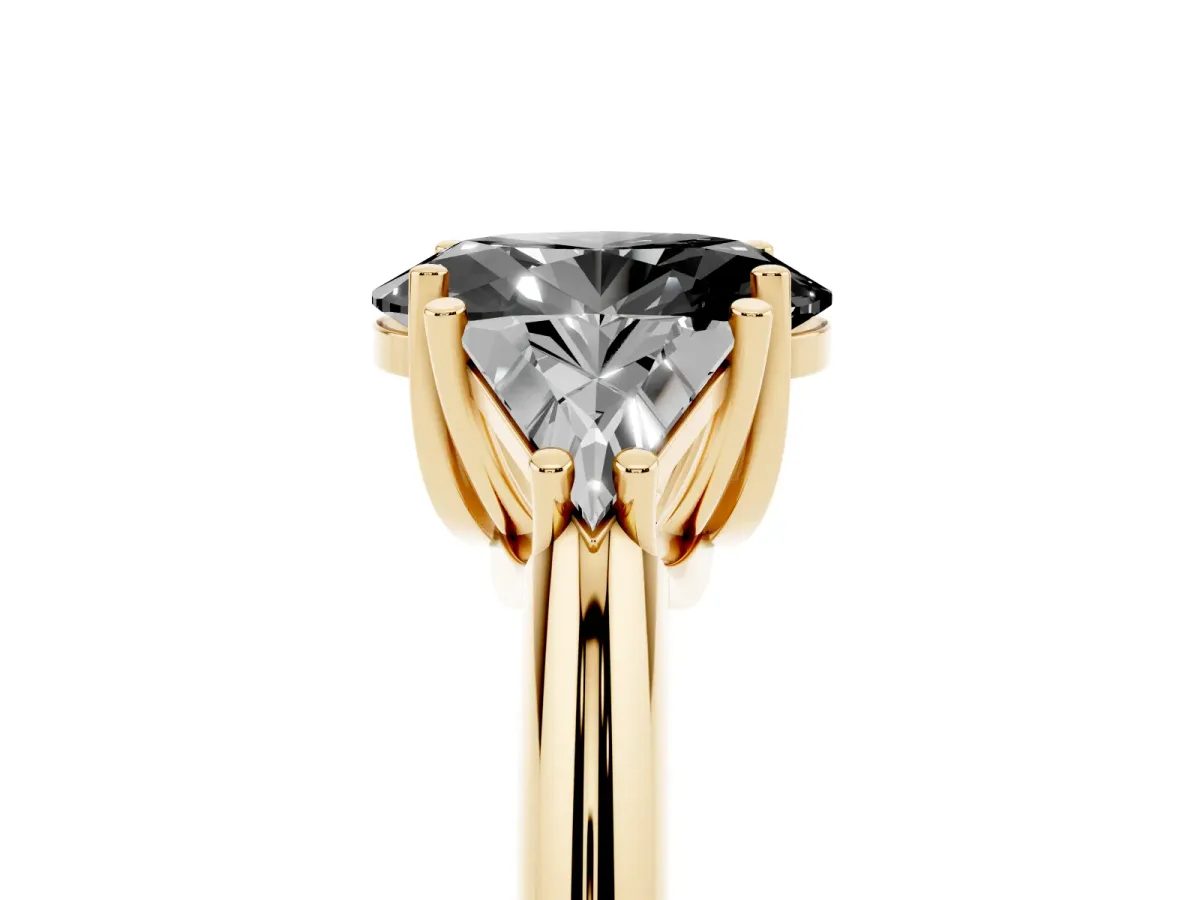 Fancy Black Three-Stone Oval Cut Diamond Engagement Ring with Trillion Side Stones and Prong Setting Yellow gold