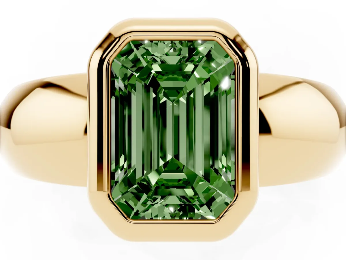 Fancy Green Bezel Set Emerald Cut Solitaire Ring with Wide Band Yellow gold