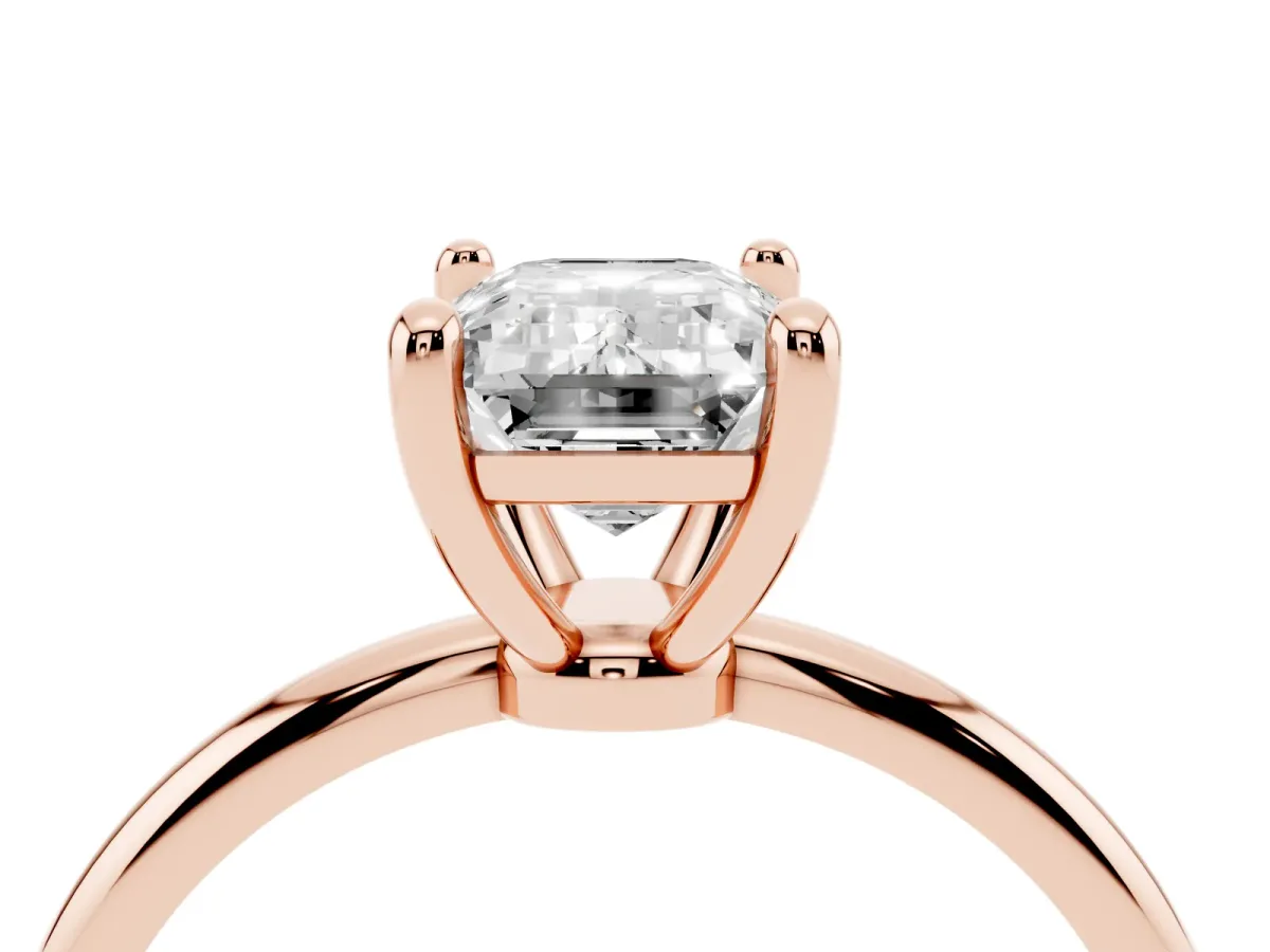 Emerald Cut Solitaire Diamond Ring with 4-Prong Setting on a Classic Band Rose gold
