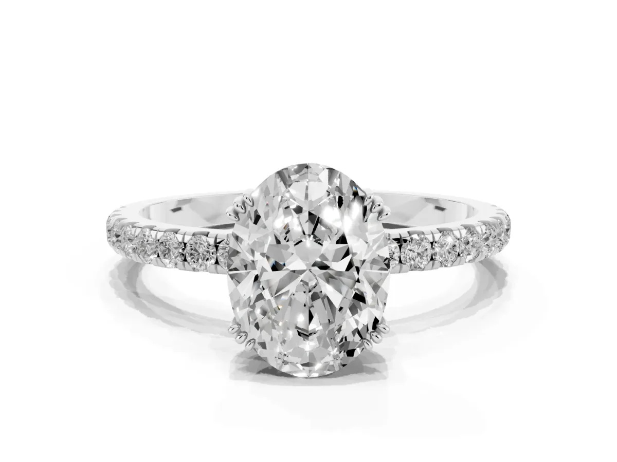 Oval Cut Brilliant Solitaire with Pavé Band and Claw Prong Setting Silver