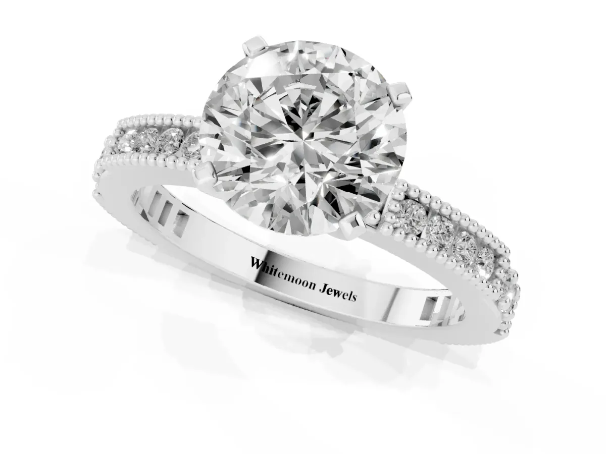 Round Cut Solitaire with Pavé Band and Four-Prong Setting Silver