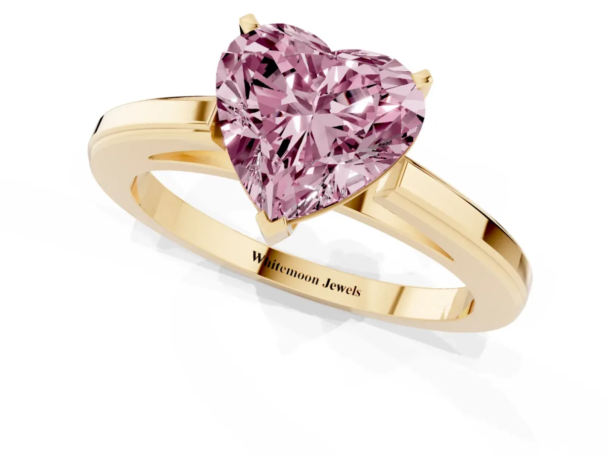 Fancy Pink Heart Cut Solitaire Diamond Ring with Four-Prong Setting and Classic Band Yellow gold