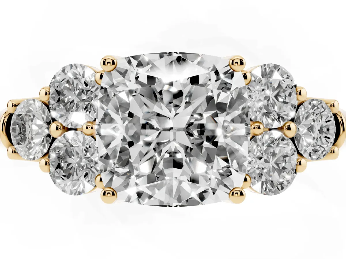 Cushion Cut Cut Diamond Cluster Ring with Round Accent Stones and Prong Setting on a Classic Band Yellow gold