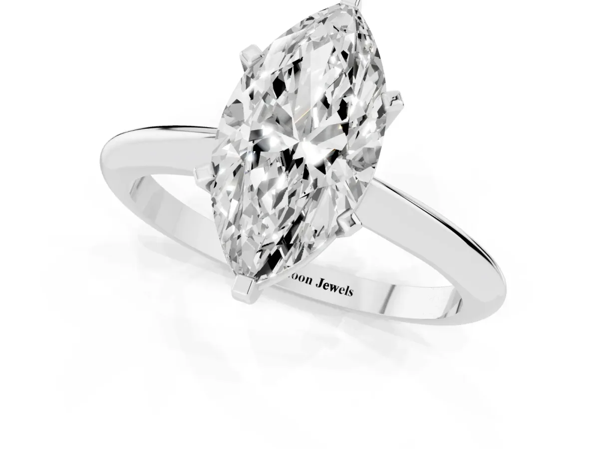 Marquise Cut Cut Solitaire Ring with Four-Prong Setting on a Classic Band Silver