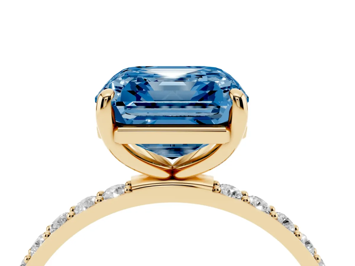 Fancy Blue Asscher Cut Diamond Solitaire Ring with Round Pavé Band and Prong Setting Yellow gold