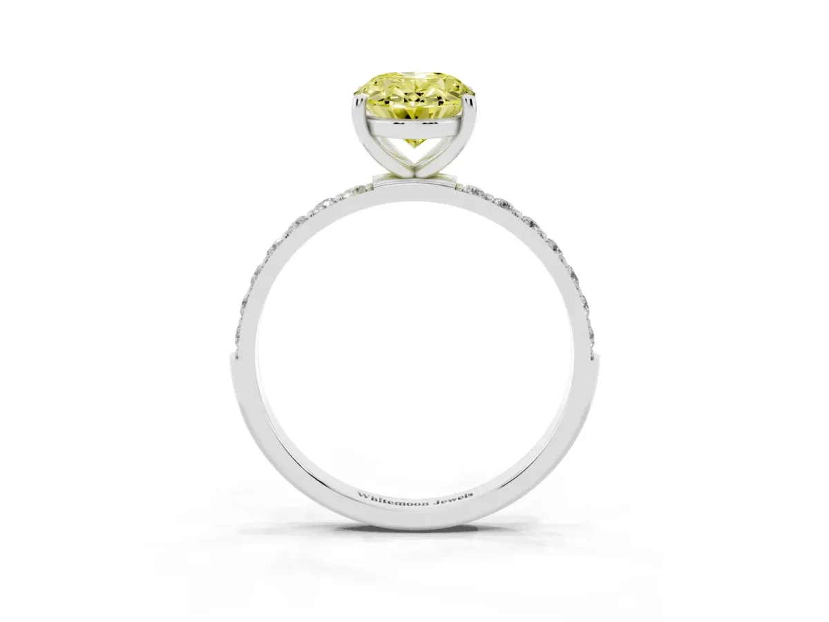 Fancy Yellow Oval Cut Diamond Solitaire Ring with Round Pavé Shoulders and Prong Setting Silver