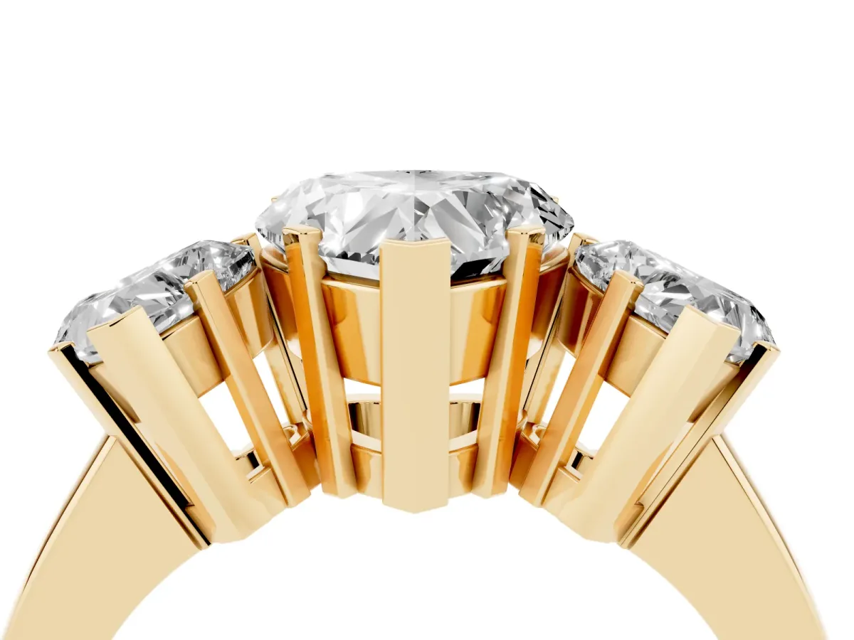 Three-Stone Heart Cut Cut Diamond Ring with Channel Set Band and Four-Prong Setting Yellow gold
