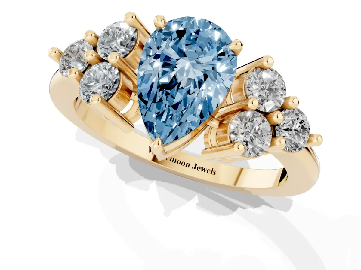 Fancy Blue Pear Cut Brilliant Diamond Cluster Accent Solitaire Ring with Prong Setting Yellow gold