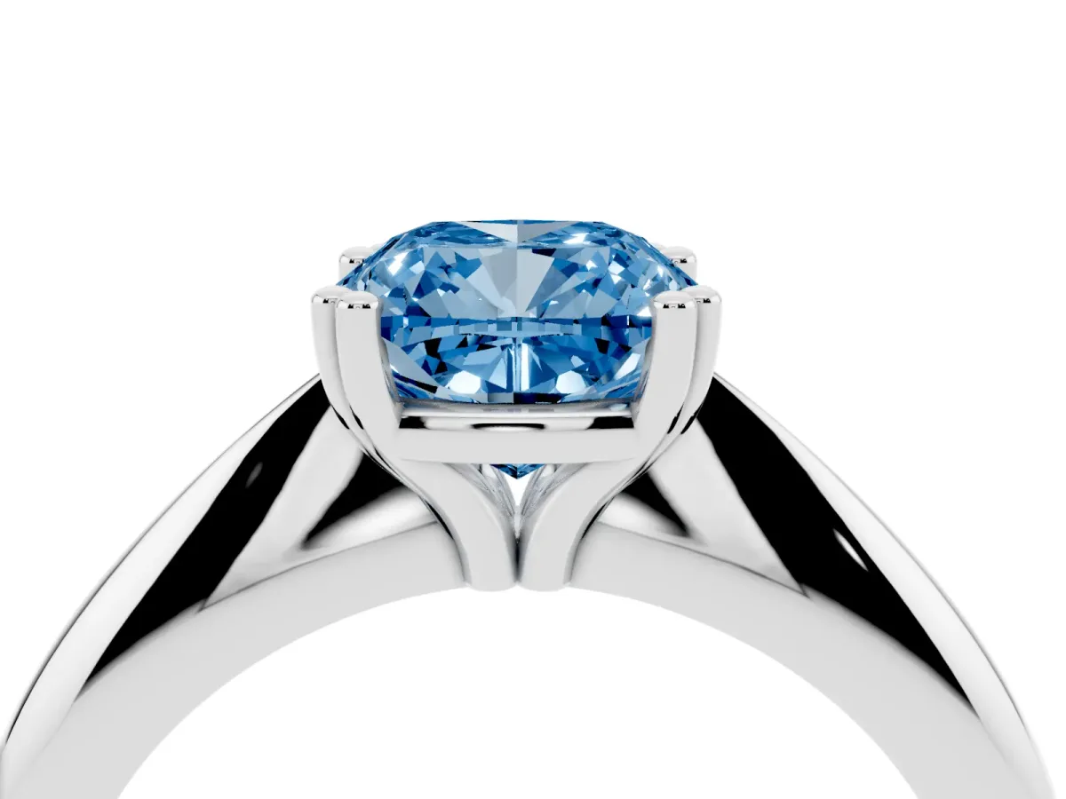Fancy Blue Cushion Cut Cut Solitaire Engagement Ring with Tapered Band and Four-Prong Setting Platinum