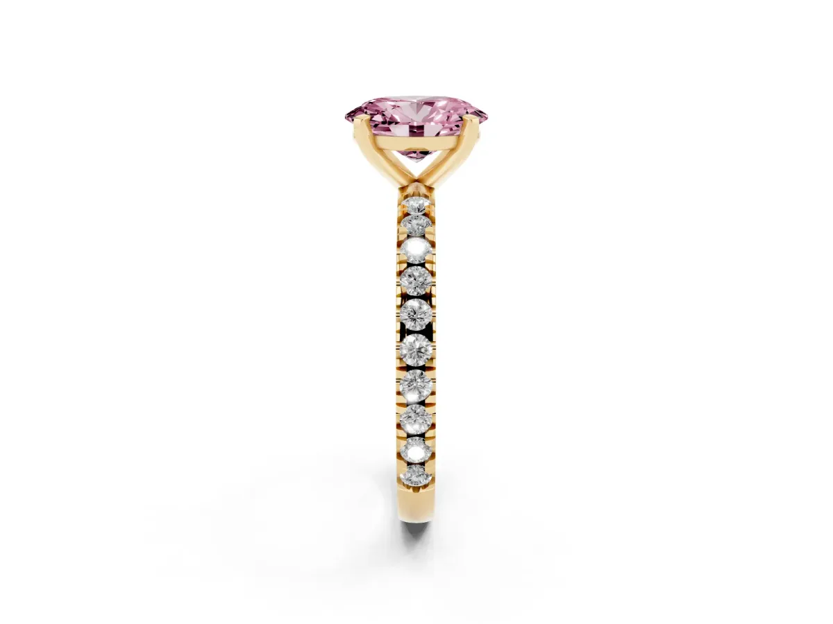 Fancy Pink Oval Cut Diamond Pavé Band Solitaire with Four-Prong Setting Yellow gold