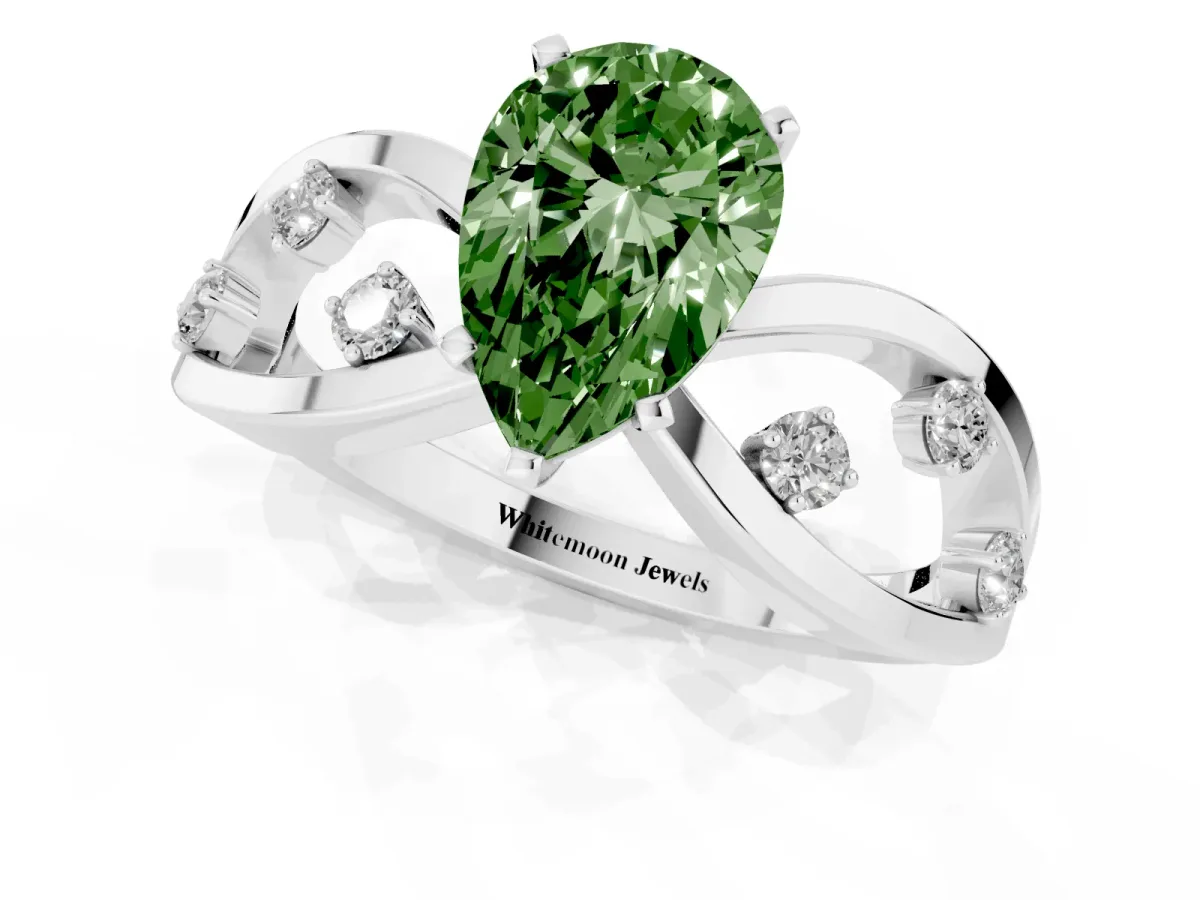 Fancy Green Pear Cut Cut Solitaire Diamond with Side Stones on Criss-Cross Band and Four-Prong Setting Silver
