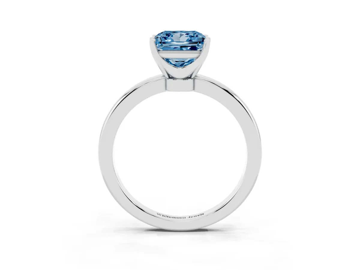 Fancy Blue Princess Cut Solitaire Diamond Ring with Six-Prong Setting on a Classic Band Silver
