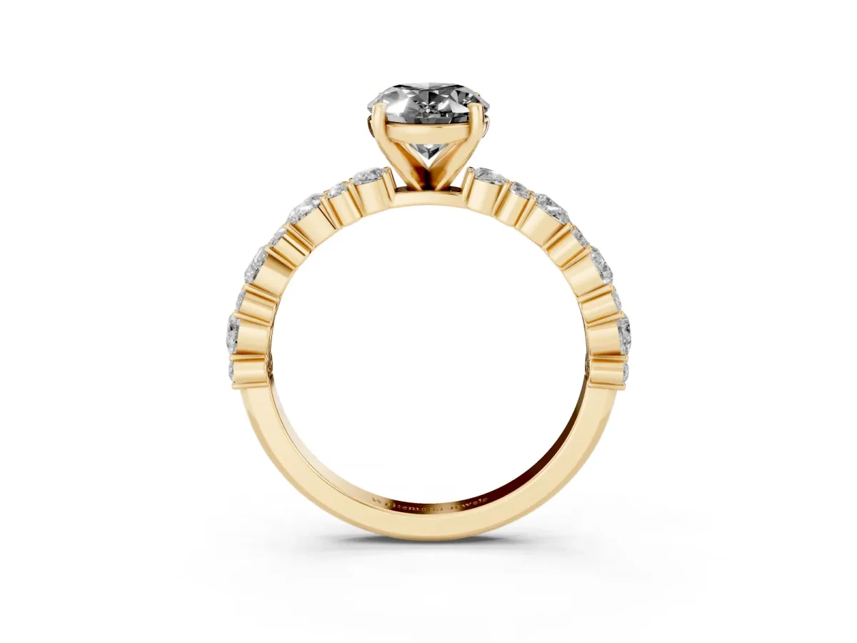 Fancy Black Oval Cut Diamond Side Stone Solitaire Ring with Round and Four-Prong Setting Yellow gold